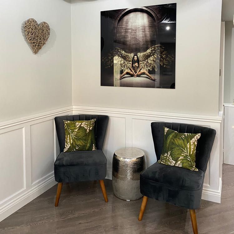 Waiting area with velvet chairs
